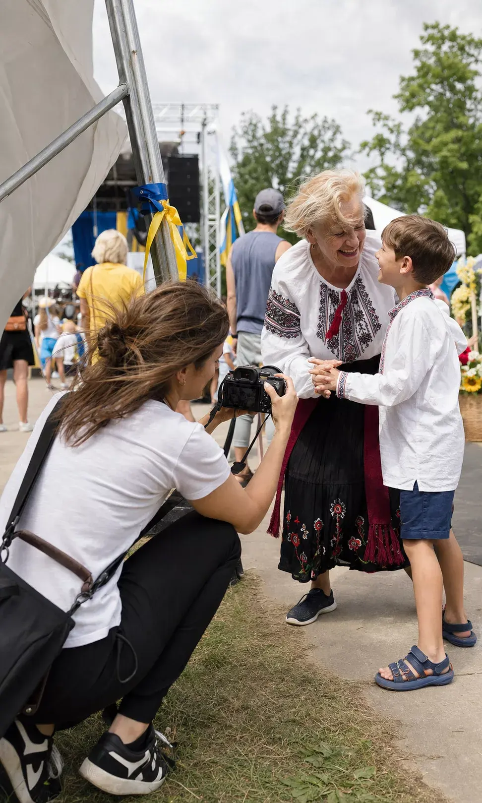 A volunteer photographer preparing to document a community event
